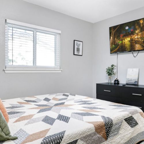 Smart TV and full-length mirror included.
