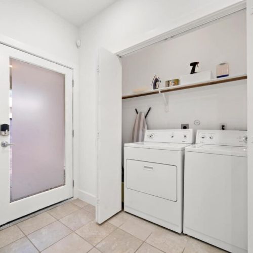 Fully-equipped laundry room.
