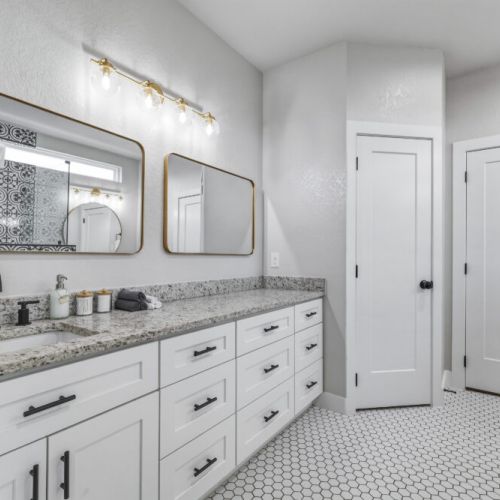 Primary bathroom is fully stocked with all you need. Makeup pads and q-tips included.