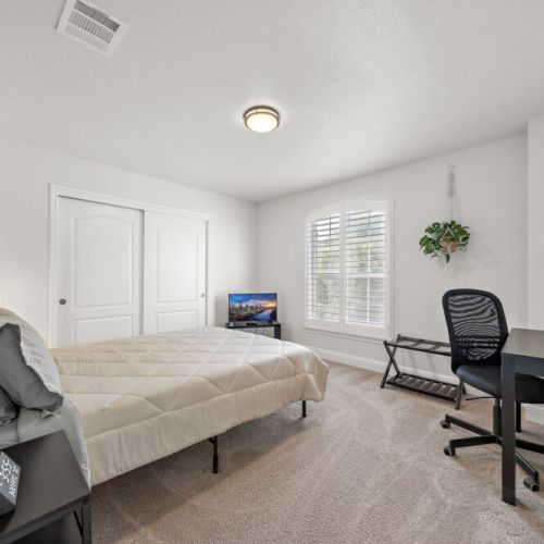 TV, desk and comfortable chair included.