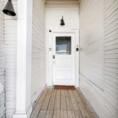 The entrance door to the building.