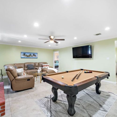 Full-size pool table included.