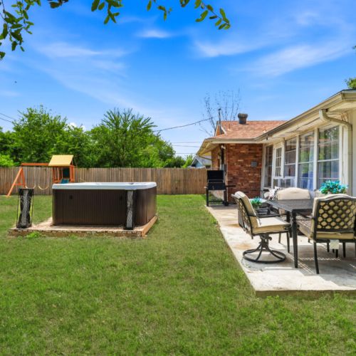 Savor the joy of cooking alfresco with our charcoal grill, creating delicious meals while enjoying quality moments with your family and friends in our amazing hot tub. Plus, we include a swing set for the little ones and a cornhole set!