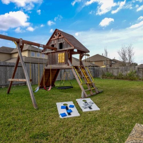 Let the kids run wild in our awesome playhouse, then gather the whole crew for a friendly cornhole showdown!