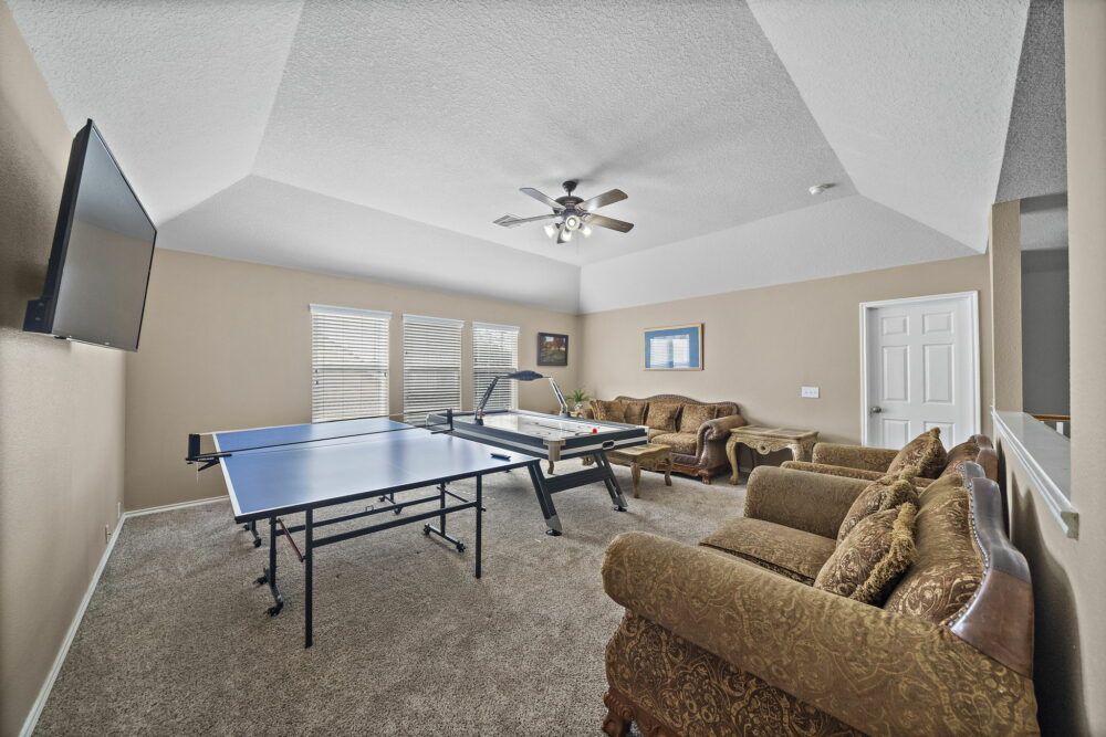 Game room with air hockey and ping pong
