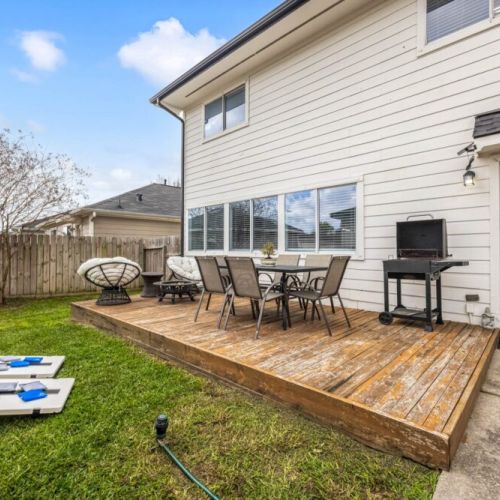 Your backyard retreat — BBQ cookouts, fire pit evenings & friendly cornhole battles.