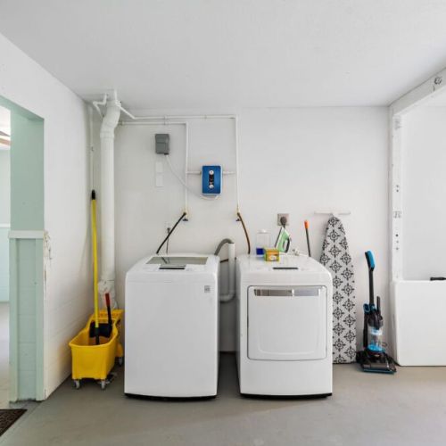 Fully-equipped laundry room.