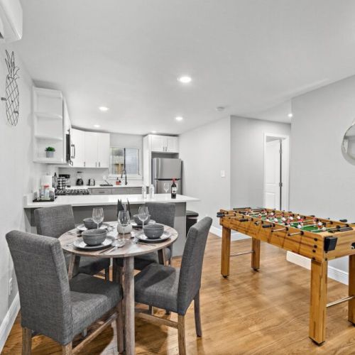 Spacious dining table with full tableware and silverware included.