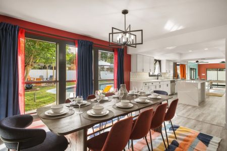Spacious main  dining table that sits 10 with full tableware and silverware included.