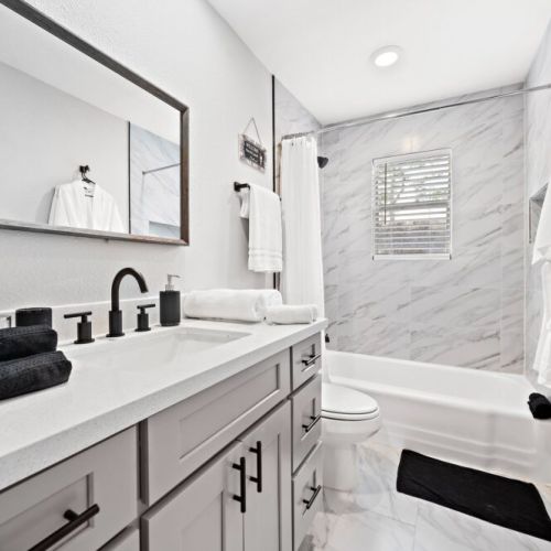 2nd full bathroom is fully stocked with all you need. White robes included.
