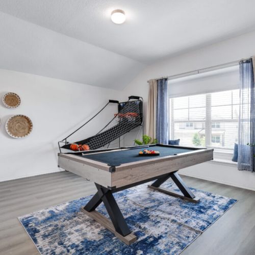 Enjoy endless fun in our game room with a pool table and a basketball arcade for the perfect hangout!