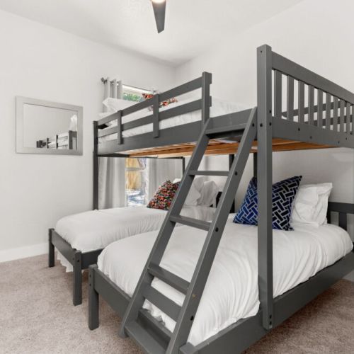 3rd bedroom with full size bed and 2 twin size beds (triple bunk bed).
