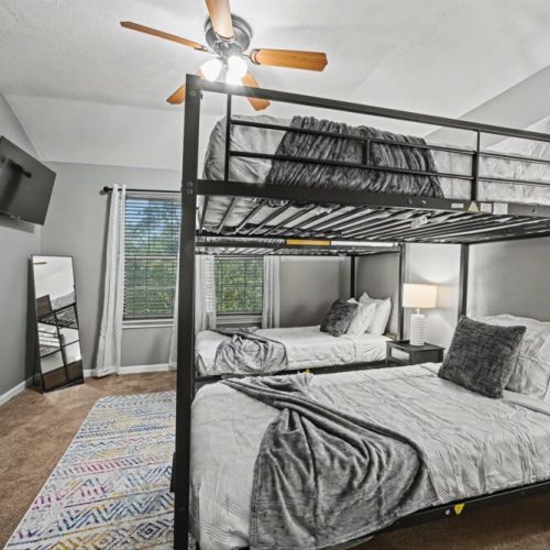 We include a smart TV and a full-length mirror here too!