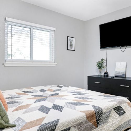 Smart TV and full-length mirror included.