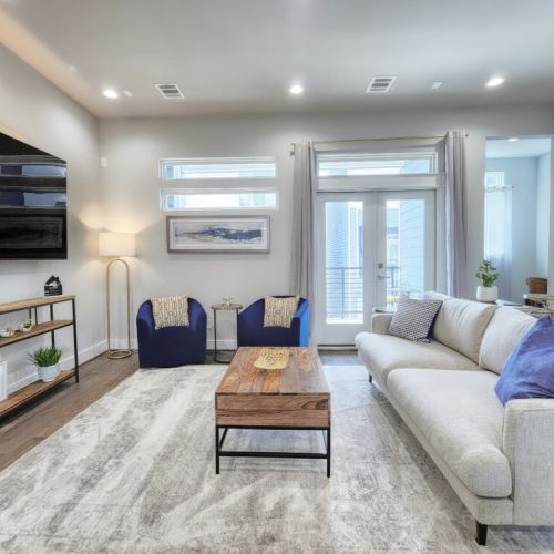 Step into comfort and style with our modern-designed living room.
