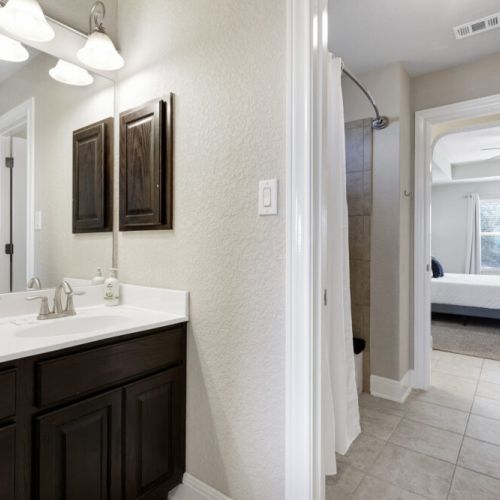 Shared access from bedrooms 2 and 3 and with separate sink areas