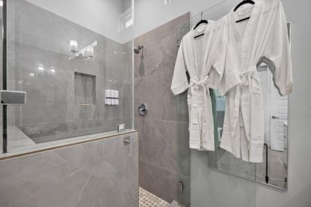 Primary bathroom is fully stocked with all you need. 
