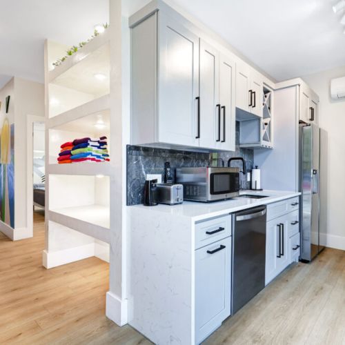 Kitchenette off first floor opens to the backyard with BBQ and smoker