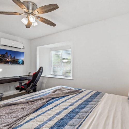 Desk, gaming chair and smart TV included for your convenience.