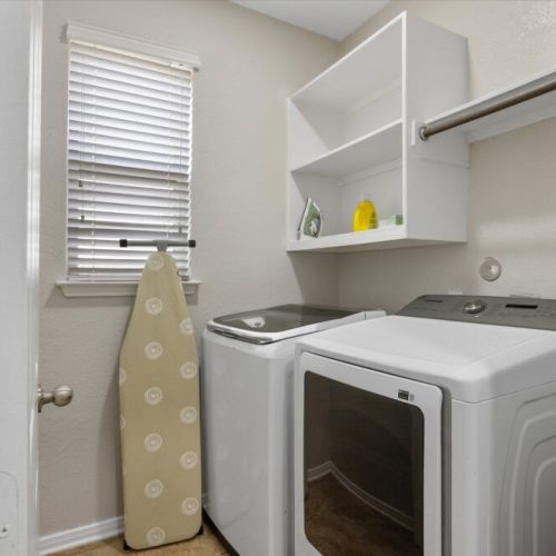 Fully-equipped laundry room.