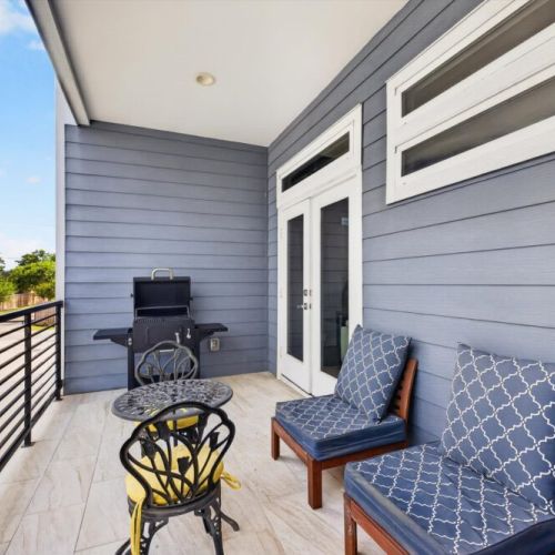 Start your day with a fresh cup of coffee and great conversation in this cozy balcony corner.
 Later, take advantage of the private BBQ setup to whip up delicious al fresco meals and dine under the stars.
