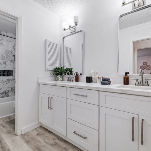 Primary bathroom is fully stocked with all you need. Makeup pads and q-tips included.