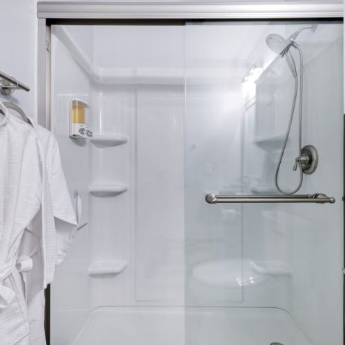 Pour yourself a glass of wine & relax. White robes included.