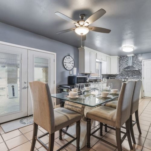 Spacious main dining table that sits 6 with full tableware and silverware included.