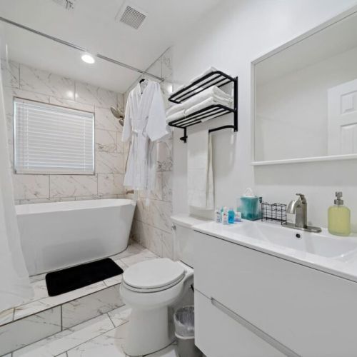 All bathrooms include makeup pads, and q-tips. White robes included.