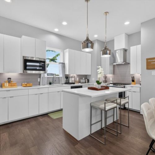 Our beautiful kitchen to whip up amazing meals for the whole group. Also, two bar stools for your convenience!