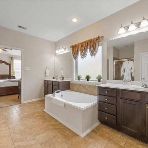 Primary bathroom is fully stocked with all you need. Makeup pads and q-tips included.