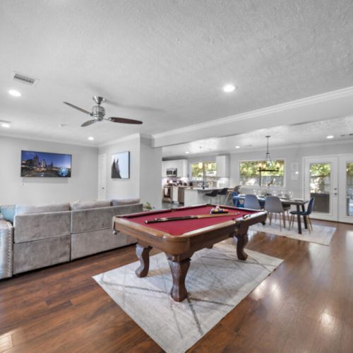 Full-size pool table included.