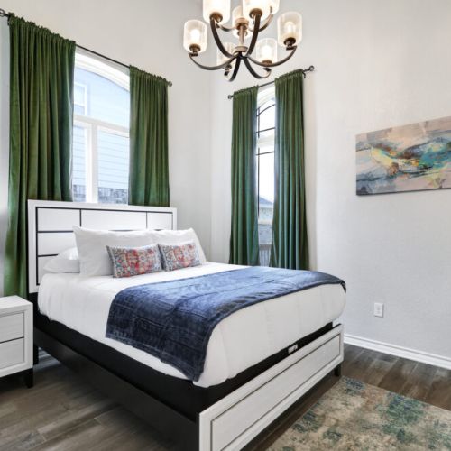 4th bedroom with queen size bed.