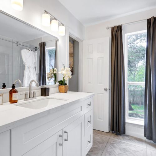 Primary bathroom is fully stocked with all you need. Makeup pads and q-tips included.