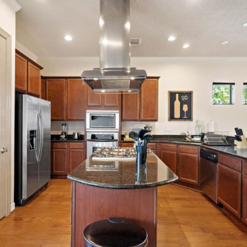 Fridge dispenses water and ice! Stainless steel appliances.