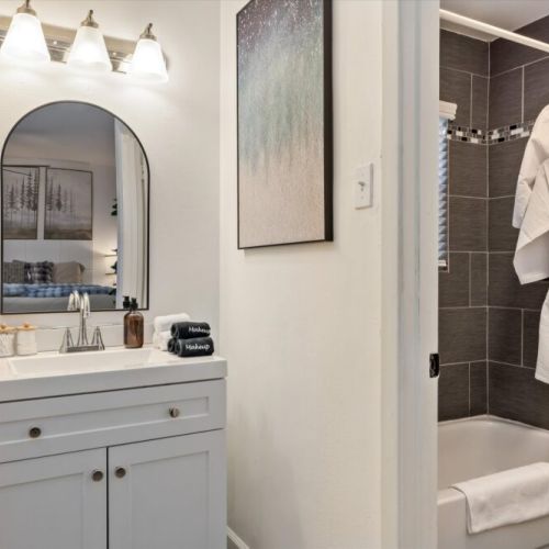 Primary bathroom is fully stocked with all you need. Makeup pads and q-tips included.