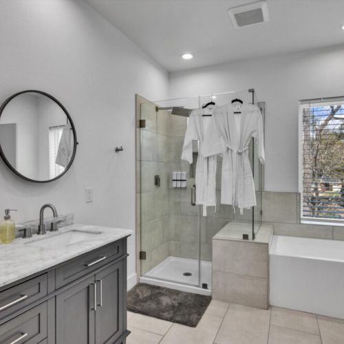 Primary bathroom is fully stocked with all you need. Makeup pads and q-tips included.