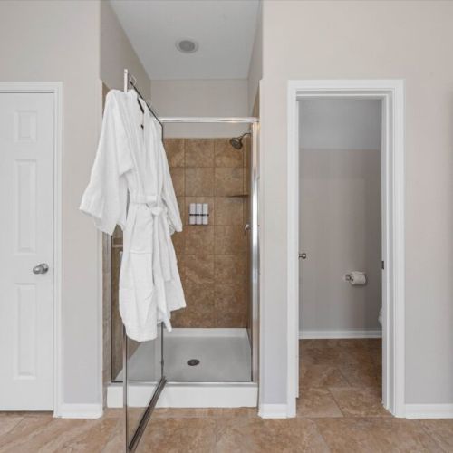 White robes and towels included.