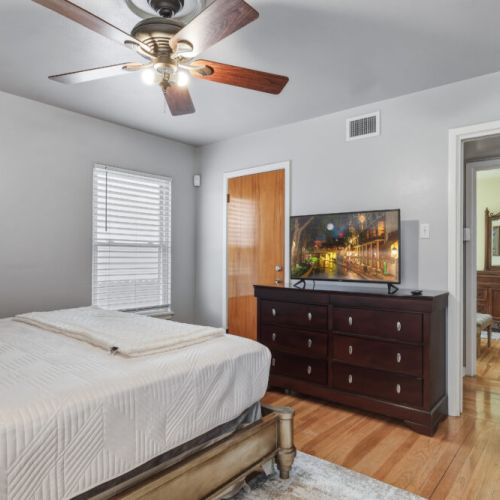 TV and full-length mirror included.