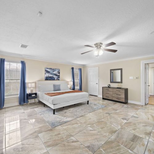 Primary bedroom with king size bed. Super comfortable memory foam mattresses.
