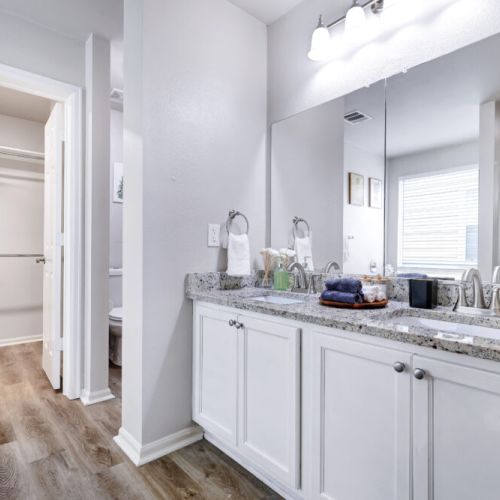 Pour yourself a glass of wine & relax. White robes included.