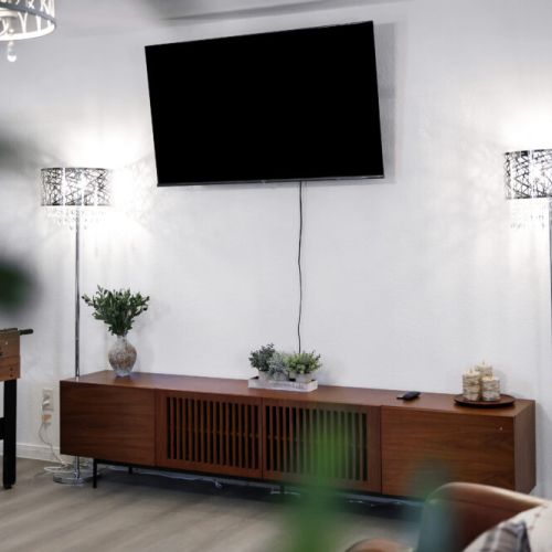 Large smart TV included.