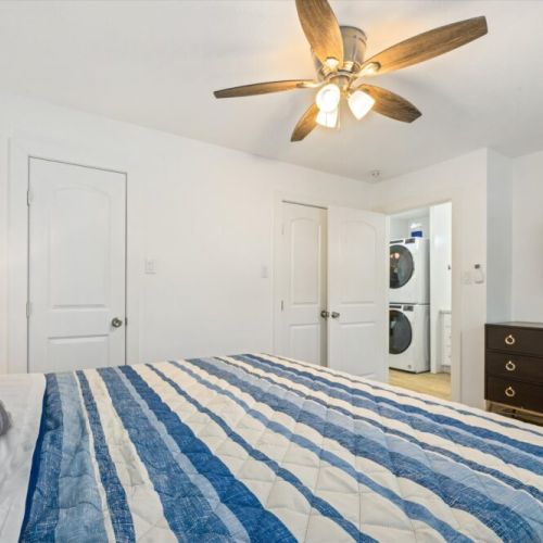 Smart TV and dresser included.
