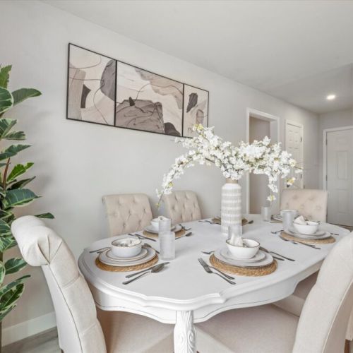 Spacious main dining table that sits 6 with full tableware and silverware included.