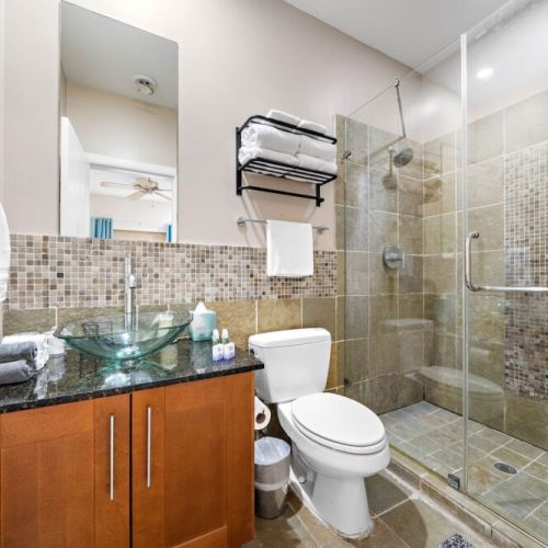 3rd full bathroom is fully stocked with all you need. White robes included.