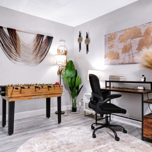 Need to get some work done? No problem! Want to have some fun, too? Well, you're in the right place! Enjoy our multi-game foosball table and stay productive at this comfortable desk.