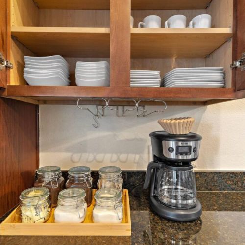 Coffee bar includes regular coffee, decaf, tea, sugar, cream, and sweetener.