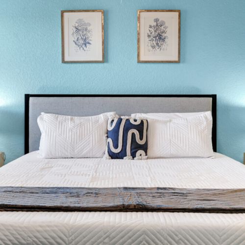 It sure looks comfy! TVs included in all bedrooms.