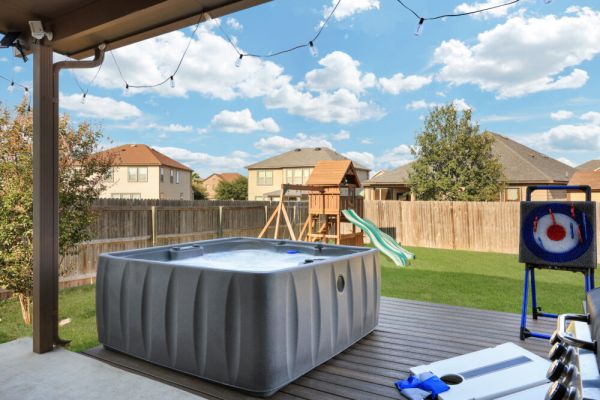 Hot Tub Retreat | Games BBQ Air Hockey Swing Set