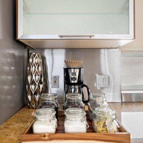 Coffee bar includes regular coffee, decaf, tea, sugar, cream, and sweetener.